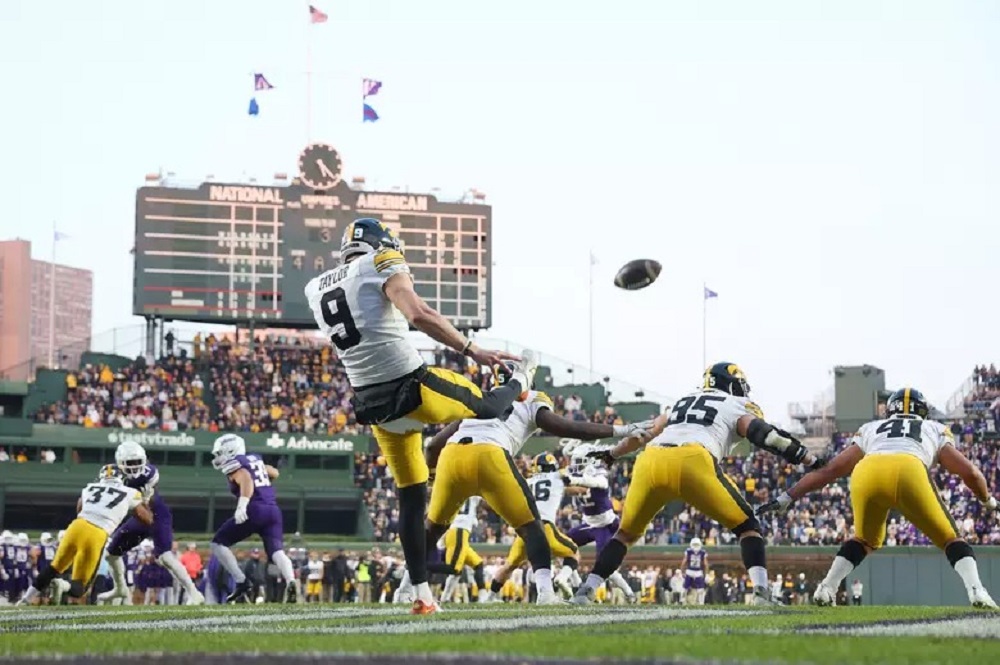 Hawkeye Football Fan Gets Hit in the Head